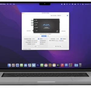 Interfaz del software AJA eMini-Setup abierta en un ordenador portátil, mostrando los campos de configuración de dirección IP, máscara de subred y puerta de enlace para un procesador AJA ColorBox conectado.