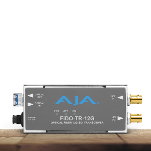 Transceptor AJA FiDO-TR-12G para transmisión y recepción profesional de señales 12G-SDI mediante fibra óptica.